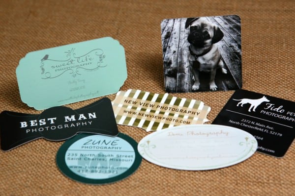 A collection of custom shaped business cards.