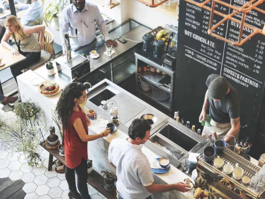 Customers In Coffee Shop
